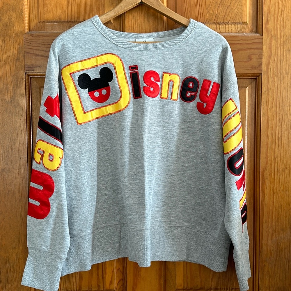Disney Parks women’s sweatshirt. Sz L. Like new